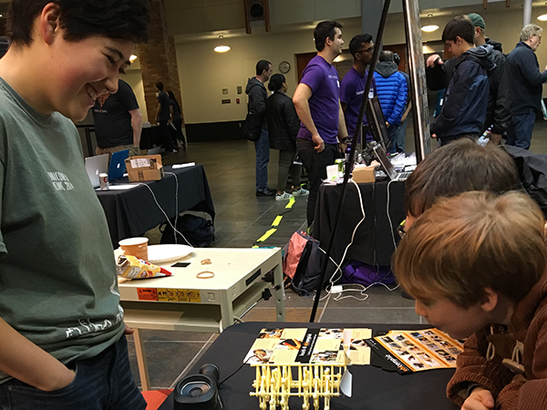 Students try an interactive demo at the 2016 Computing Open House