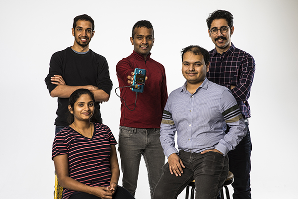 Team members, clockwise from top left: Vikram Iyer, Shyam Gollakota holding smartphone, Elyas Bayati, Arka Majumdar, Rajalakshmi Nandakumar