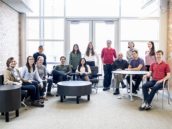 Group photo of Molecular Information Systems Lab members in the Paul G. Allen Center on the UW campus in Seattle.