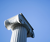 Sylvan Grove column against blue sky