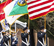 Reserve Officers’ Training Corps (ROTC) members carry flags during the University of Washington's annual Veterans Day Ceremony.