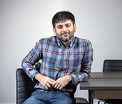 Ratul Mahajan sitting at a desk facing the camera.