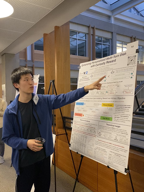 Yanmin Wan, Madrona Prize winner, presenting his poster to attendees at the 2025 Research Day.