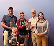 Members of the "Freedom to Roam" research team pose with their SIGACCESS ASSETS Paper Impact Award.